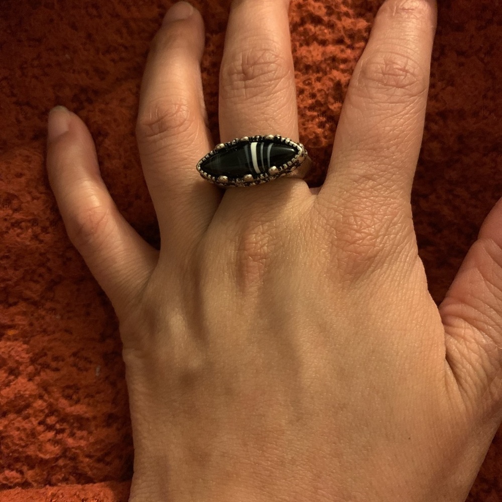 Ring black oval shaped design